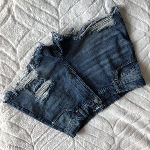 Unworn, distressed, high rise blue jeans